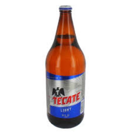 Order TECATE LIGHT 32oz BOTTLE food online from Duke Liquor & Jr. Market store, Los Angeles on bringmethat.com