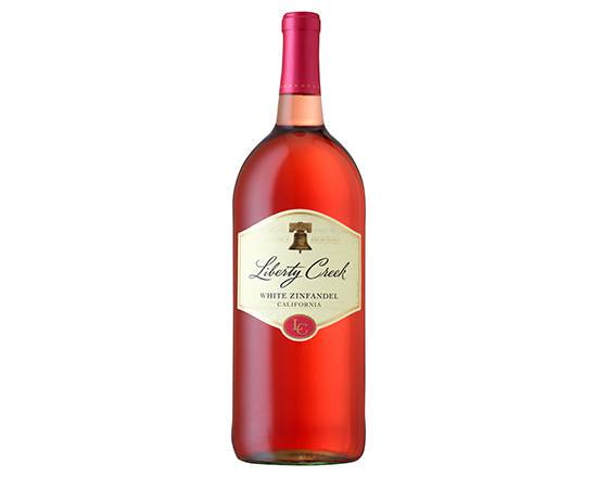 Order Liberty Creek Vineyards White Zinfandel Wine, 1.5L blush wine (7.5% ABV) food online from Bellerose Wines & Liquor store, Queens on bringmethat.com