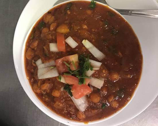 Order Chana Masala food online from Tikka Masalaa Indian Restaurant store, Tampa on bringmethat.com