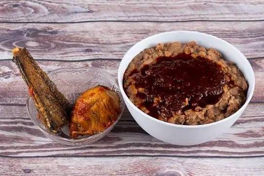 Order Ewa-agoyin food online from Wazobia Kitchen store, Houston on bringmethat.com