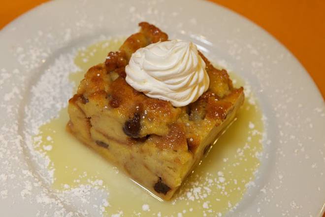 Order Bread Pudding with Whiskey Sauce food online from Buttercup Kitchen Family Restaurant store, Vallejo on bringmethat.com