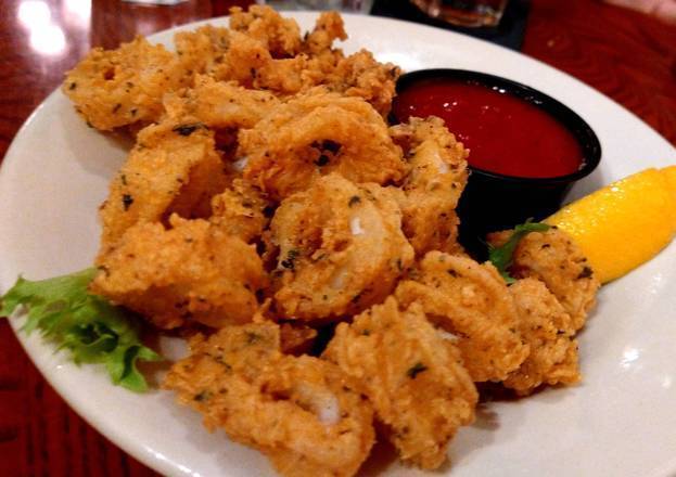 Order Fried Calamari food online from Harold Seltzer Steakhouse store, St. Petersburg on bringmethat.com