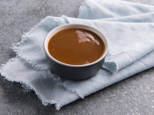 Order Caramel Dip food online from Auntie Anne's store, Baltimore on bringmethat.com