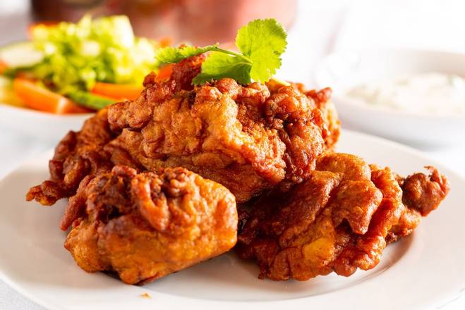 Order Murgh Pakoda food online from Desi Chops store, Chicago on bringmethat.com