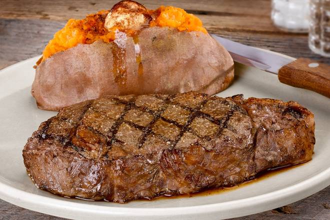Order 12 oz. Signature Ribeye food online from Logan's Roadhouse store, N. McAllen on bringmethat.com