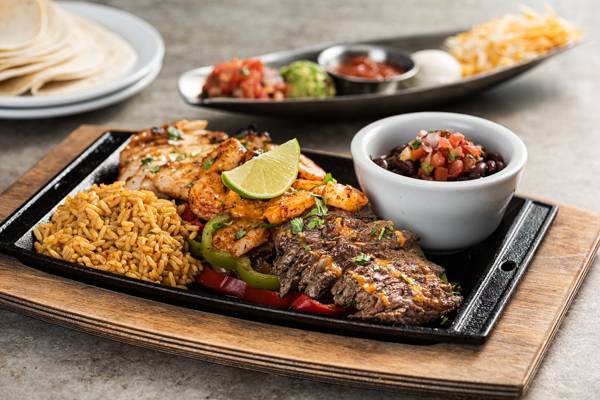 Order Mix & Match Fajita Trio food online from Chili store, Chico on bringmethat.com