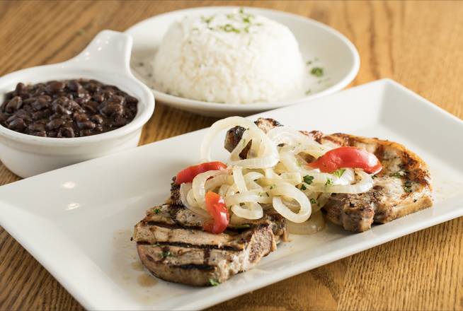 Order Chuletas de Puerco a la Parrilla food online from Latin Cafe 2000 store, Miami on bringmethat.com