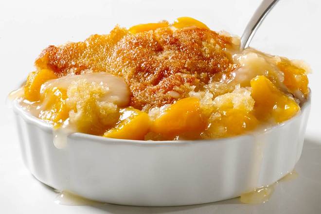 Order MEDIUM HOMEMADE PEACH COBBLER food online from Shanes Rib Shack store, Locust Grove on bringmethat.com