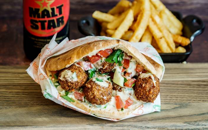 Order Falafel In A Pita food online from Holy Schnitzel store, Roseland on bringmethat.com