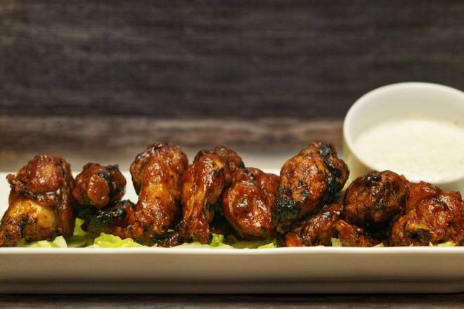 Order Dozen Wings food online from Holy Schnitzel store, Aventura on bringmethat.com