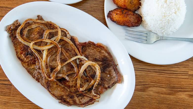 Order #10 Bistec De Palomilla (Top Sirloin Steak) food online from Versailles store, Encino on bringmethat.com