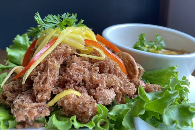 Order Yum Pla Duk Fuu* (ยำปลาดุฟู) food online from Charm Thai Restaurant store, Silver Spring on bringmethat.com
