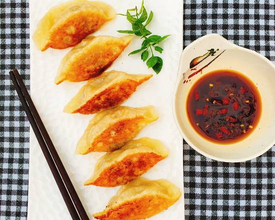 Order F3. Chicken and Vegetable Pot Sticker (6) 鸡肉锅贴 food online from Chopsticks Cuisine store, Seattle on bringmethat.com