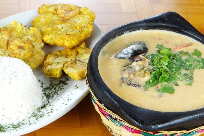 Order Cazuela de Mariscos con Arroz y Tostones food online from El Patio Colombian Restaurant store, Hollywood on bringmethat.com