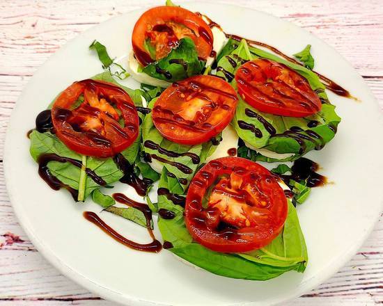 Order Caprese Salad food online from Selma Chicago Pizzeria store, Rancho Santa Margarita on bringmethat.com