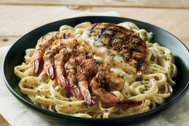 Order Queensland Chicken & Shrimp Pasta food online from Outback Steakhouse store, Vacaville on bringmethat.com