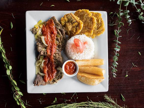 Order Bistec a la Criolla food online from La Parrilla Latin Food Llc store, Chicago on bringmethat.com