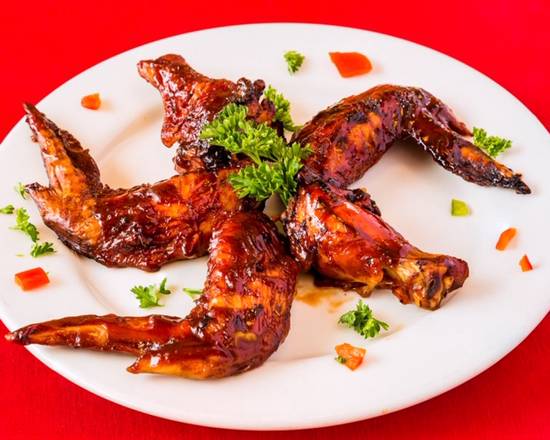 Order Jerk BBQ Wings food online from Jerk Pit Tampa store, Tampa on bringmethat.com