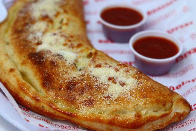 Order Chicken Alfredo Calzone food online from King's Pizza store, Daytona Beach on bringmethat.com
