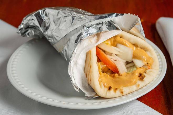 Order Hummus and Pita food online from King's Pizza store, Daytona Beach on bringmethat.com