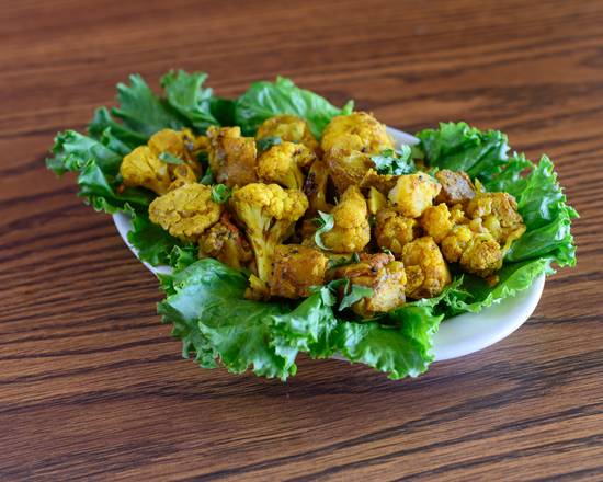 Order Aloo Gobhi food online from Vegan Rva store, Richmond on bringmethat.com