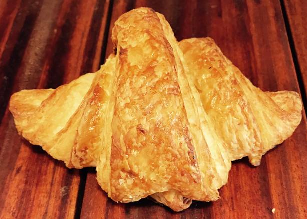 Order Butter Croissant food online from Sugar Bakery & Coffeehouse store, Seattle on bringmethat.com