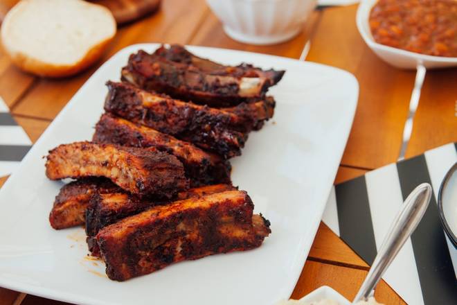 Order 1/2 Slab Pork Ribs food online from Brothers BBQ store, Denver on bringmethat.com