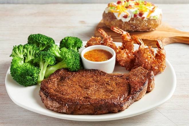 Order 12oz Ribeye* & Choice of Shrimp food online from Outback Steakhouse store, Vacaville on bringmethat.com