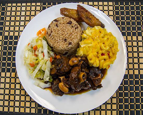 Order Braised Oxtail Meal  food online from Golden Krust store, Pine Hills on bringmethat.com