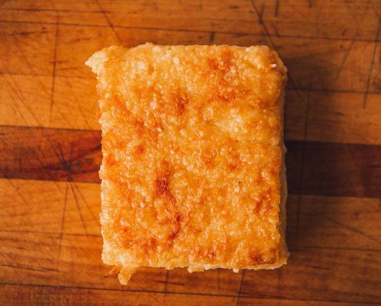 Order Baked Cheese Grits food online from 4 Rivers Smokehouse store, Jacksonville on bringmethat.com