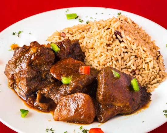 Order Brown Stew Chicken food online from Jerk Pit Tampa store, Tampa on bringmethat.com