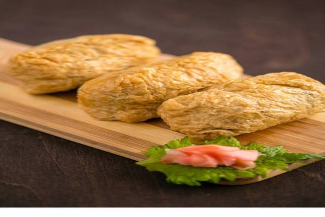 Order Bean Curd Inari food online from Shogun Japanese Restaurant store, Palm Harbor on bringmethat.com