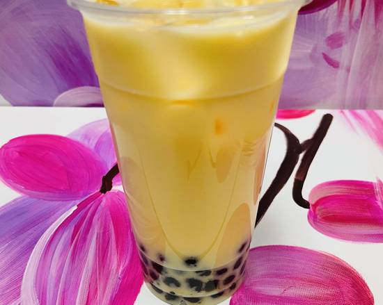 Order Passion Fruit Milk Tea  food online from Pho Binh Minh store, Maple Valley on bringmethat.com