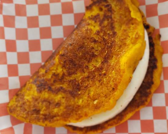 Order Cachapa Queso (Cheese) food online from Arepas Donde Flor store, Riverview on bringmethat.com