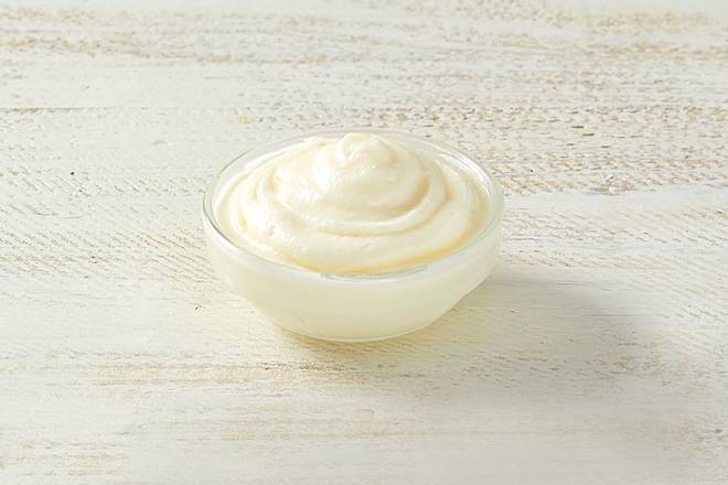 Order Side of Cream Cheese Frosting food online from Cinnabon store, Houston on bringmethat.com