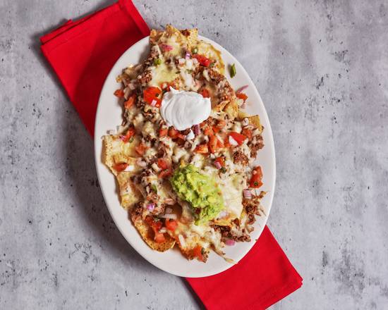 Order Nachos Supreme food online from Speedy G Tacos, Tamales, Tostadas Y Tal store, Plainfield on bringmethat.com