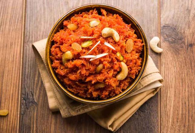 Order Gajer Halwa 1lb food online from Mezban Restaurant store, Houston on bringmethat.com