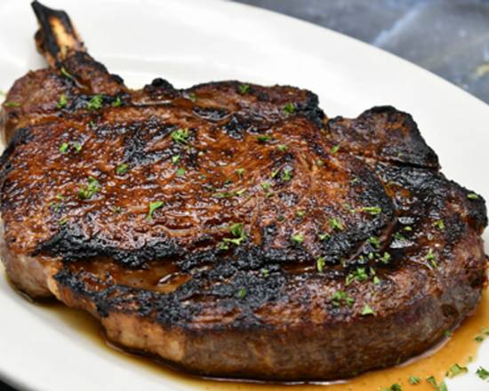 Order 22 oz. Prime Bone-In Ribeye food online from Morton The Steakhouse store, Orlando on bringmethat.com