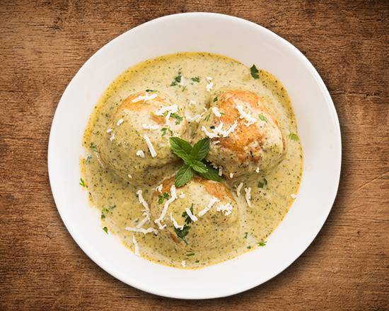 Order Creamy Veggie Dumpling Curry food online from United Kitchens Of India store, Schaumburg on bringmethat.com