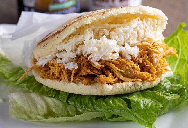 Order Catira Arepa (Shredded Chicken & Cheese) food online from Don Pan International Bakery store, Miami on bringmethat.com