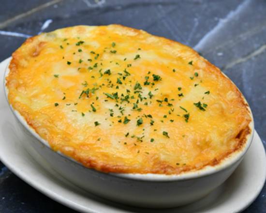 Order Smoked Gouda & Bacon Au Gratin Potatoes food online from Morton The Steakhouse store, Orlando on bringmethat.com