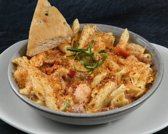Order Creole Mac N Cheese food online from Rainforest Cafe - Galveston store, Galveston on bringmethat.com