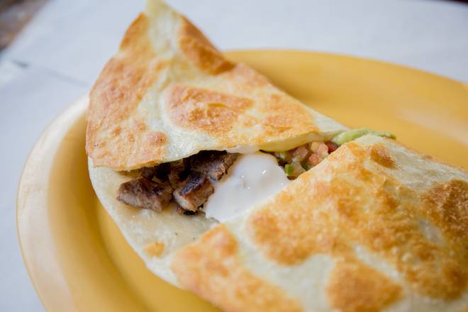 Order Super Flour Quesadilla food online from La Victoria Taqueria store, San Jose on bringmethat.com