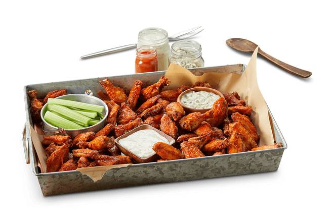 Order Traditional Wings food online from Famous Daves store, Ft. Myers on bringmethat.com