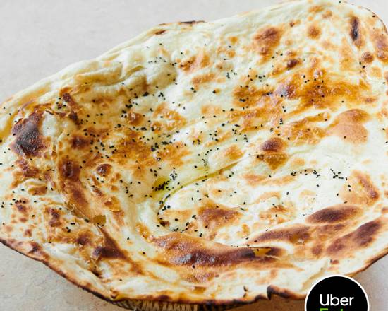 Order Large Hadramout Tandoori Rashoosh Flat-Bread food online from Hadramout Restaurant store, New York on bringmethat.com