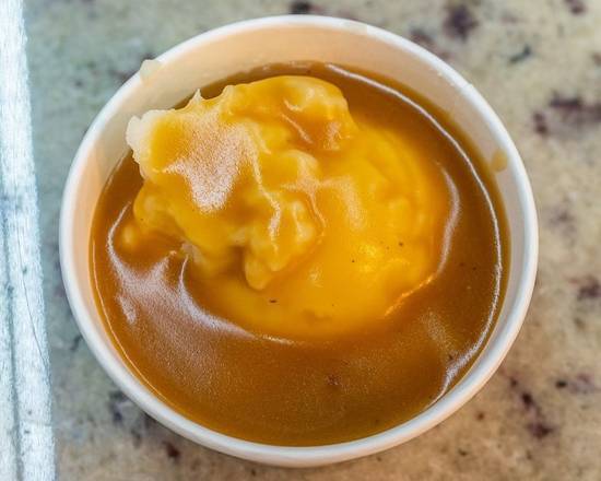Order Mashed Potatoes & Gravy (Sides) food online from Krispy Krunchy Chicken store, Minneapolis on bringmethat.com