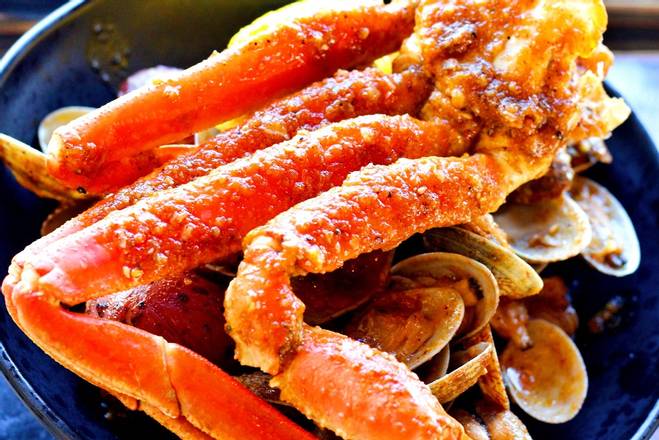 Order C3. Clams (1/2Lb) food online from Captain King's Seafood City store, Memphis on bringmethat.com