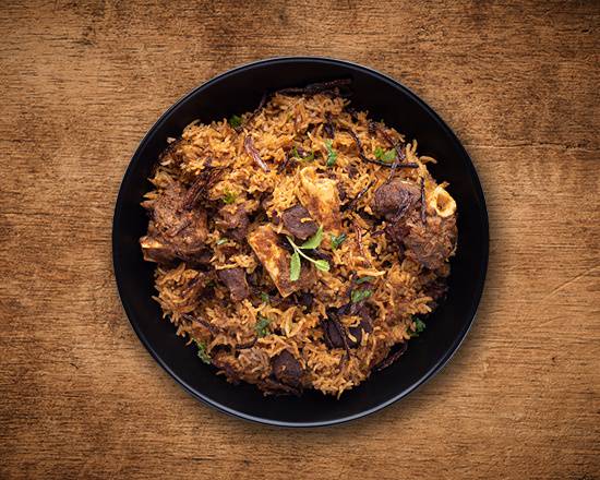 Order Yum Goat Biryani food online from United Kitchens Of India store, Schaumburg on bringmethat.com