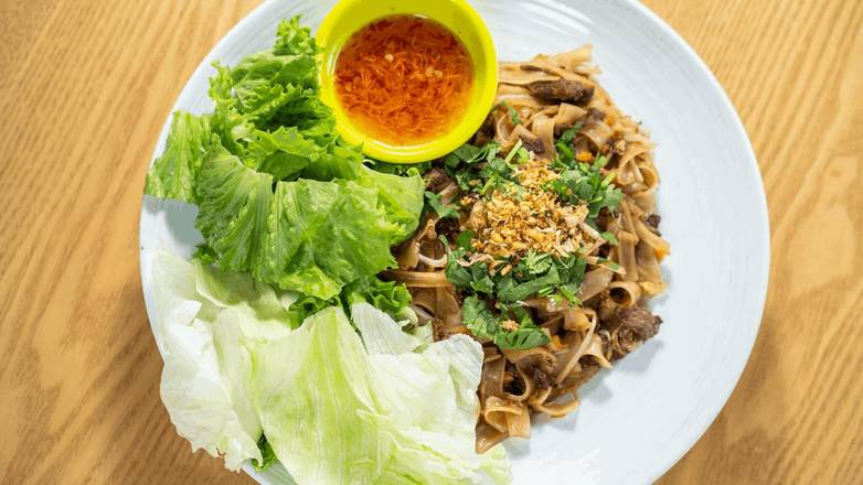 Order F11 Guay Teaw Kua Gai food online from Madam Mam's store, Bee Cave on bringmethat.com