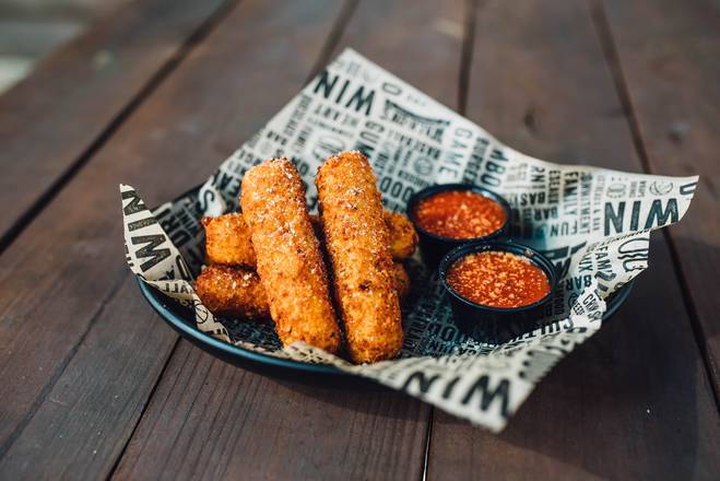 Order Mozzarella Logs food online from Walk-On Sports Bistreaux store, Tallahassee on bringmethat.com